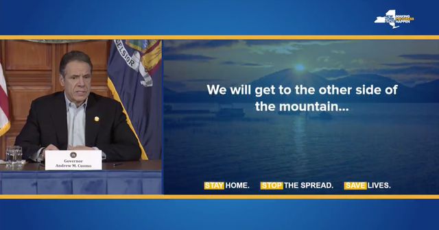 Governor Cuomo at his April 4 2020 press conference, with a slide that says "We will get to the other side of the mountain..."